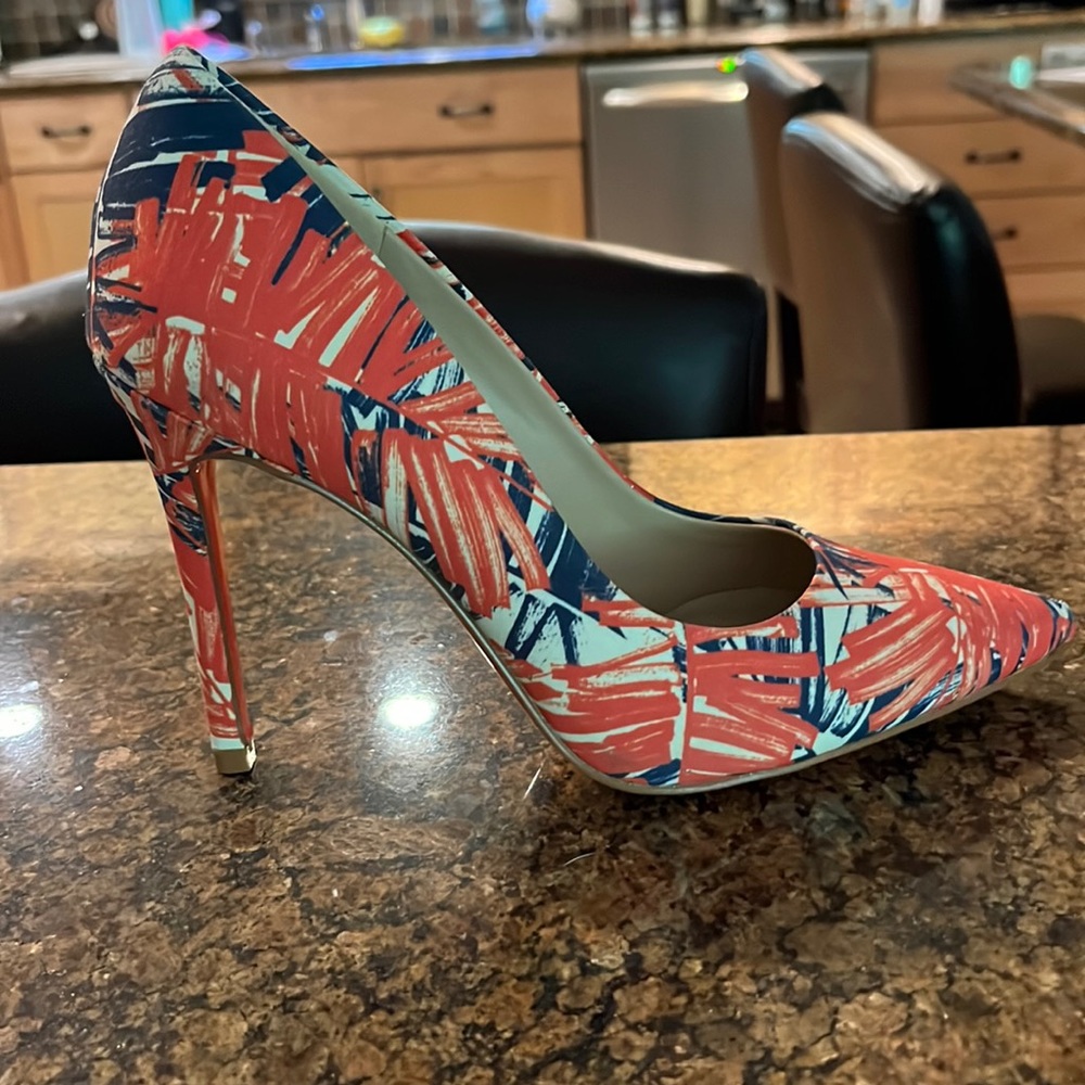 Orange and navy pumps. Brand New!